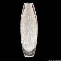 Clear front view of the tall white crackle glass vase inside thick clear glass, showing the crackled interior pattern and overall shape.