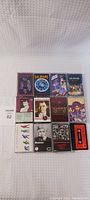 Full lot showing 12 assorted cassette tapes including Depeche Mode, Def Leppard, Robert Palmer and Madonna.