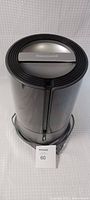 Honeywell HUL430 humidifier exterior, showing cylindrical black body with silver Honeywell label on the lid.