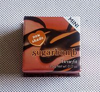 Front of the box showing brand, product name, 'new shade' and net weight.