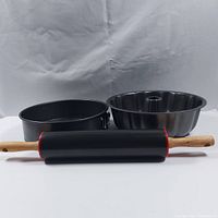 Photo showing the full set including the springform pan, fluted cake pan, and rolling pin