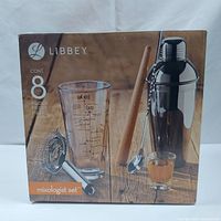 Complete Libbey mixologist set packaging box showing all 8 pieces included (one item likely counted as additional pieces such as accessories).