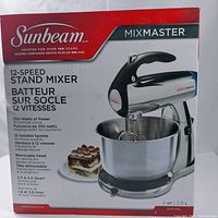 Box showing the product Sunbeam Mixmaster 12-speed stand mixer, with details such as power (350 watts) and bowl sizes (2.0 & 4.0 quart stainless steel).