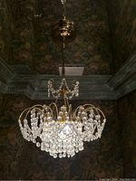 Front view of chandelier hanging from ceiling