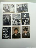 Front side showing various black and white photographs of The Beatles in suits, individual and group shots.