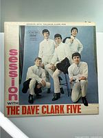 Front cover of the album showing The Dave Clark Five poses in white attire with album title text.