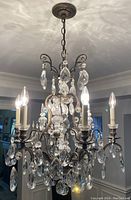 Full view of chandelier hanging in room