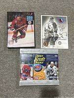 Framed Kraft Dinner boxes and Doug Gilmour Hall of Fame signed picture with sealed Kirk Muller puzzle