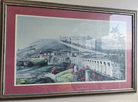 Full front view of the framed painting showcasing Brimstone Hill Fortress with arched aqueduct and vibrant landscape.