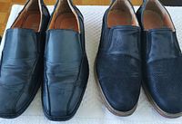 Top view of two pairs of men's dress shoes, one smooth black leather and one textured navy blue/black.