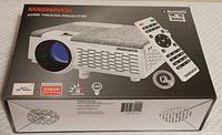 Front of the original Magnavox Home Theater Projector box showing the projector image, branding, and basic features such as Bluetooth, 1080P compatibility, LED 45 lumens, up to 100 inch screen.