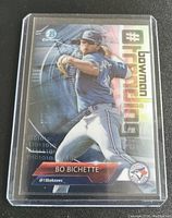 Front color image showing Bo Bichette in Blue Jays uniform with Bowman Chrome #HR1 Rookie branding in protective plastic sleeve.