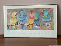 Framed art print showing six colorful stylized birds with foliage background, signed Leslie Borden Silverwater Studios, with frame.