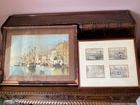 Two framed artworks shown side by side, one with a single large harbor scene, the other with four smaller maritime prints all framed under glass.