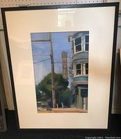 Full view of framed and matted painting showing scene and frame