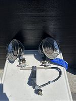 Photo of the dual propane heater heads on a metal frame, showing the overall condition and setup.