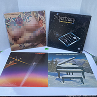 Four Supertramp vinyl albums displayed together, showing front covers including Indelibly Stamped, Crime of the Century, Even in the Quietest Moments..., and Famous Last Words.