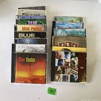 Photo of CDs stacked showing album covers of Blue Rodeo and Great Big Sea.