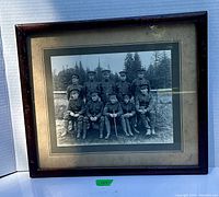 Framed vintage black and white group photo of military personnel from Quebec