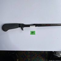 Photo of the handle and upper part of the Shimano SpeedMaster Fightin' Rod SM-1553 fishing rod showing ergonomic black grip and rod taper.