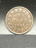 Reverse side of 1888 Canadian large cent showing 'ONE CENT 1888' with maple leaf wreath design.
