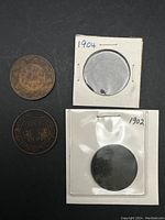 Four Canadian large cent coins with dates 1901, 1902, 1903, and 1904. Coins show circulated condition with wear.