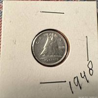 Reverse side showing Bluenose schooner, date 1948, and denomination