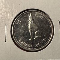 Reverse view showing the howling wolf design and inscriptions