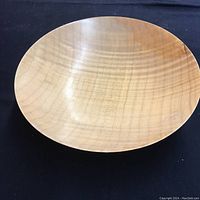 Top view of the wooden bowl showing smooth finish and natural wood grain