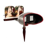 Side view of the antique metal and wood stereoscope with Bride on her Wedding Day stereoscopic card inserted showing dual images.