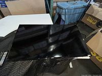 Top view of the Samsung 50-inch LED TV screen surface, showing black bezel and screen.