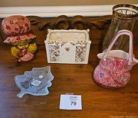 Overall lot of decorative knick knacks including Napco planter, figurine, glass purse, vase, glass star dish