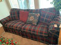 Front view of Ethan Allen plaid upholstered sofa with two large seat cushions, back cushions, and decorative throw pillows.