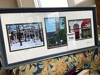Framed triptych showing behind glass three signed prints by Heather Hall depicting local scenes: Winter Summerhill house, Grant Hall clock tower, Cocamo storefront.