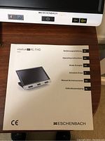 User manual for Eschenbach Visolux Digital XL FHD, featuring multi-language instructions and model number 16551 on cover.