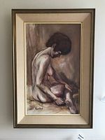 Full front view of framed oil painting showing seated nude woman and frame