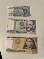 Front side of three banknotes: 5 Zaire, 5000 Intis Peru, and 500 Intis Peru