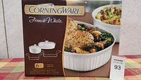 Box front showing Corningware French White 6 piece set with prepared food inside one dish