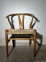 Front view showing seat weave and backrest