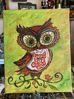 Front view of oil painting showing full owl artwork on green textured background with artist signature 'Blevy'