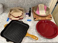 Full set of cookware and bakeware including casseroles, pie plates, peeler, and grill pan