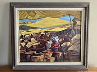 Framed oil painting showing full scene of market under canopy