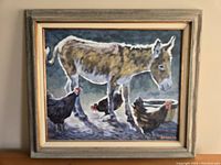 Front view of the framed oil painting showing donkey and chickens