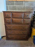 Full view of the Kroehler high boy dresser showing top and bottom drawers, wood grain finish, and metal handles.