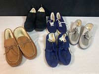 Photo showing all five pairs of shoes including brown moccasin slippers, navy sneakers, gray casual shoes, black slip-ons.