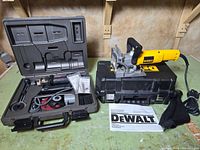 DeWalt plate joiner on its hard case, Rotozip spiral saw kit open with attachments