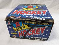 View of front and top of the blue Bowman Hockey Premier Edition box featuring bubble gum cards branding with NHLPA logo.
