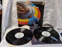 Double vinyl LP record set with album cover and two vinyl discs visible