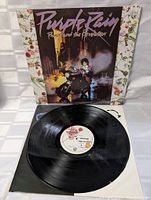 The vinyl record itself showing label design and surface condition.