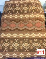 Full view of the wool blanket showing pattern and colors